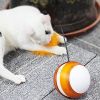 Rolling Pet Toys Interactive 360 Degree Automatic Self Rotating LED Light Sound Cat Chaser Ball Exercise with Detachable Feather - orange